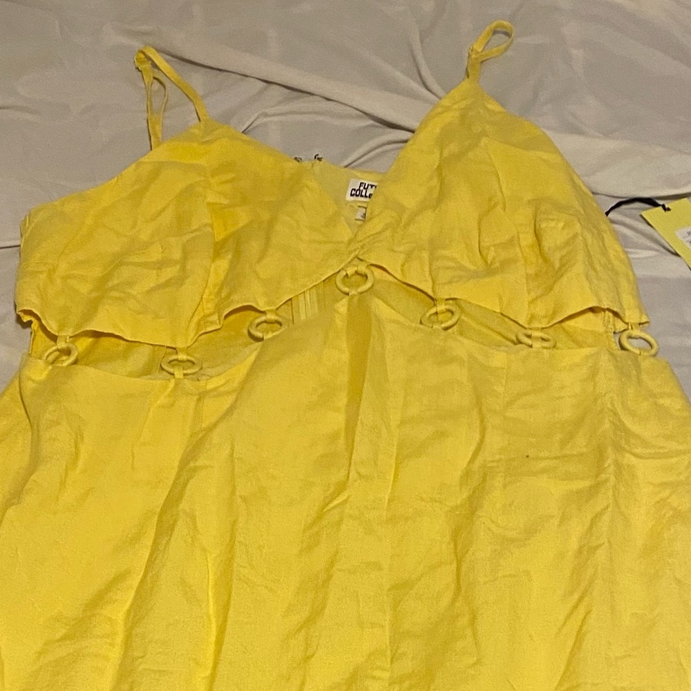 Yellow Dress with Ring Accents